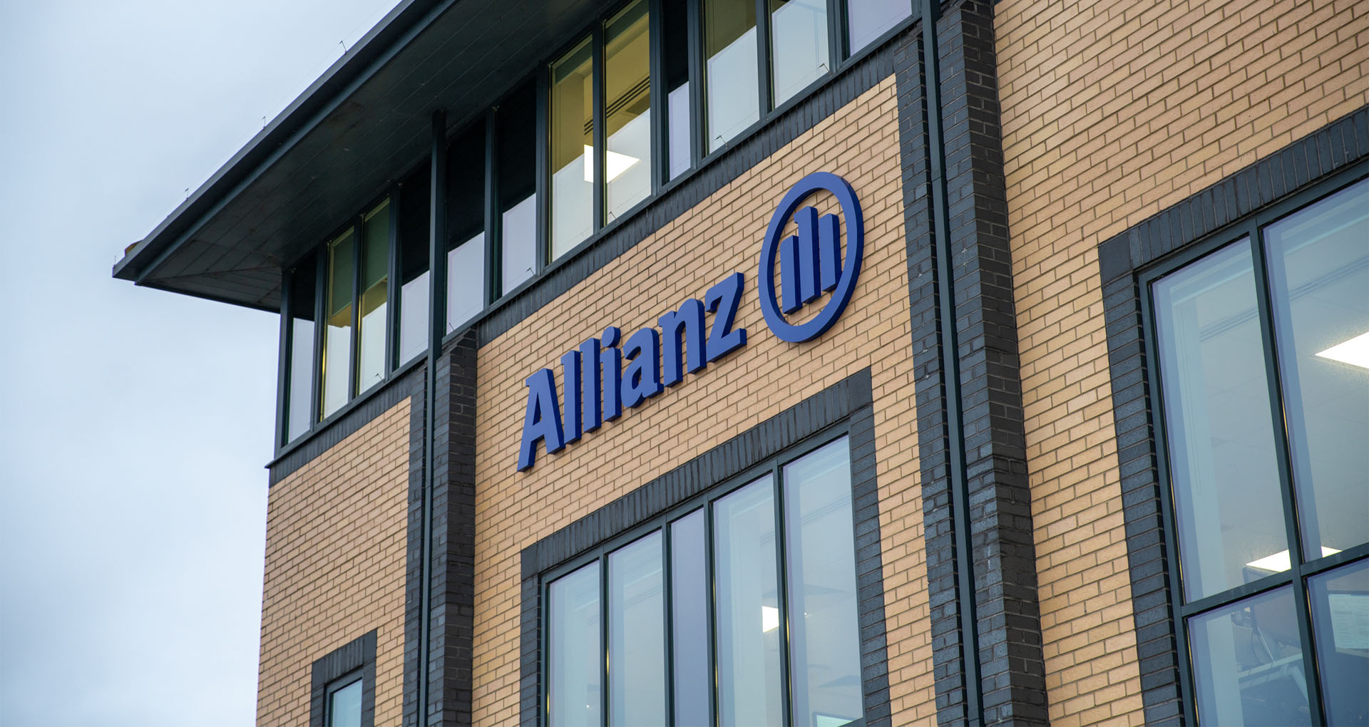 Allianz logo on the exterior of the office building