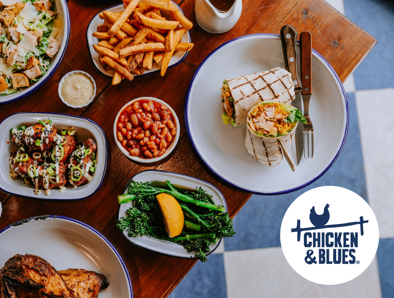 Multiple plates of food displayed on table