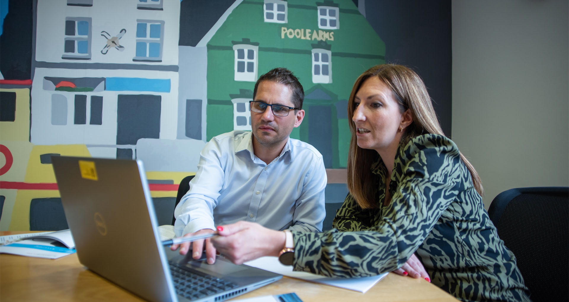 Two employees in a meeting at PKF Francis Clark.